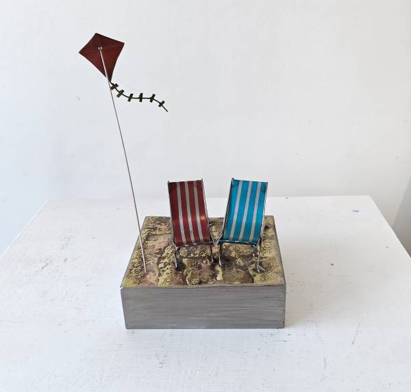 - a , metal Sculpture by Whittle Design, measuring 25 x 13 cm (H x W) £170